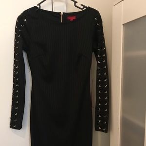 Jennifer Lopez- Long sleeved, snug fit dress